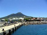 Main Pier in Charlestown Nevis.  Nevis Peak in the background.