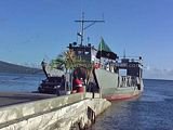 Vehicle reversing on to St Kitts and Nevis Sea Bridge Ferry